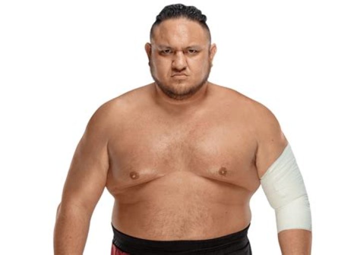 A photo of Samoa Joe looking out into the crowd before entering the ring. 