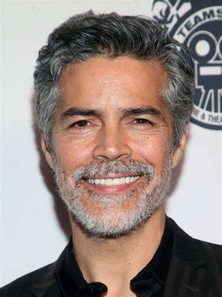 Actor Esai Morales and his wife Elvimar Silva attend the Arpa... Esai
