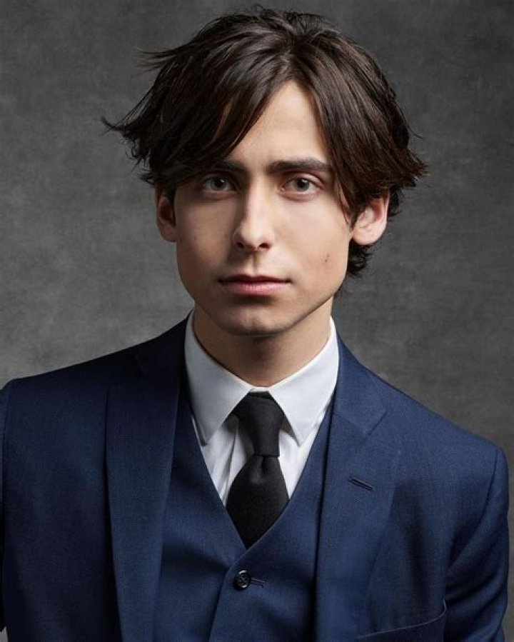 Aidan Gallagher as Spencer Walsh in Good Luck Charlie (2020-2024)