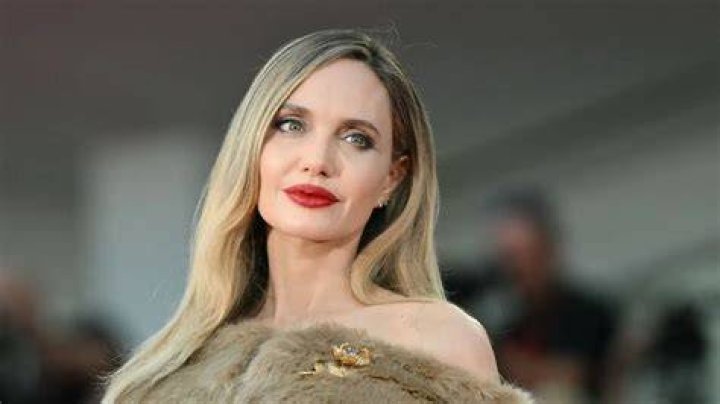 Angelina Jolie as Amber Carter in Pixie, Dixie and Mr. Jinks: The Movie