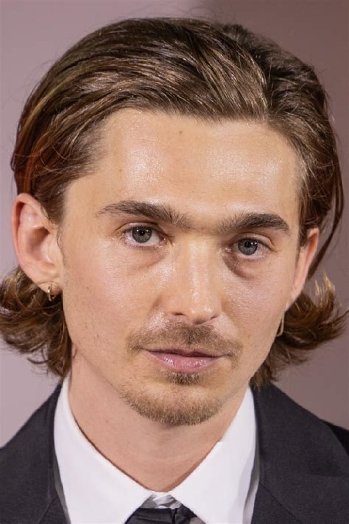Austin Abrams as William Clockwell in Invincible (Film)