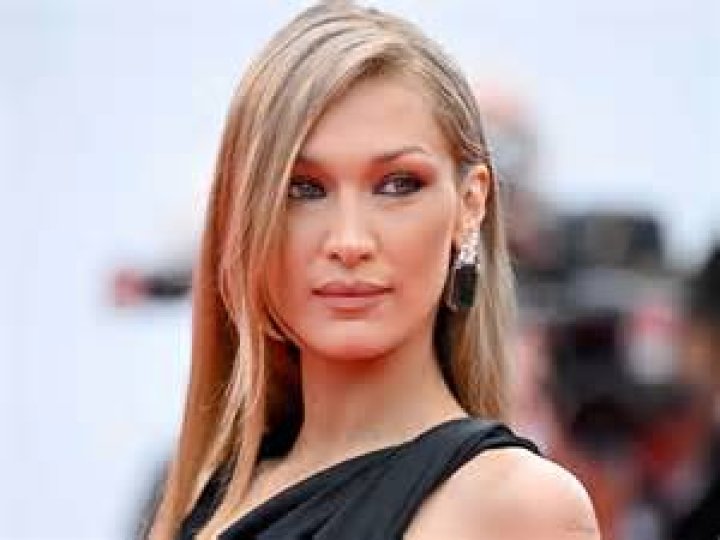 Bella Hadid debuts fringe to launch her new perfume campaign