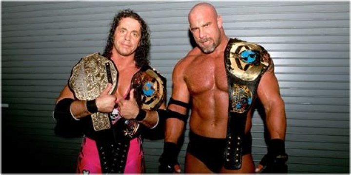 Bret Hart and Goldberg as WCW Tag Team Champions.