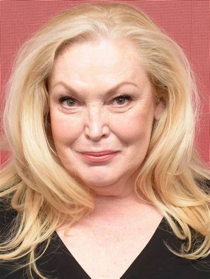 Cathy Moriarty as Beth Dutton, a financier and the daughter of John and Evelyn. in Yellowstone (90s)