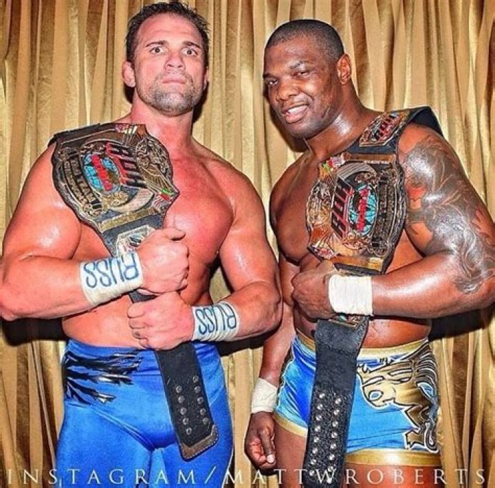 Charlie Haas and Shelton Benjamin with Kurt Angle.