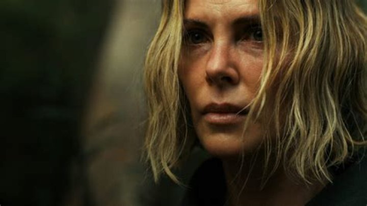 Charlize Theron as Kaa in The Jungle Book (2016)