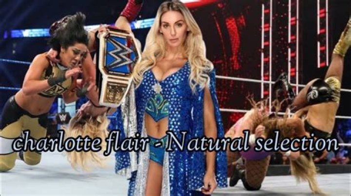 Charlotte Flair performs Natural Selection on Ronda Rousey