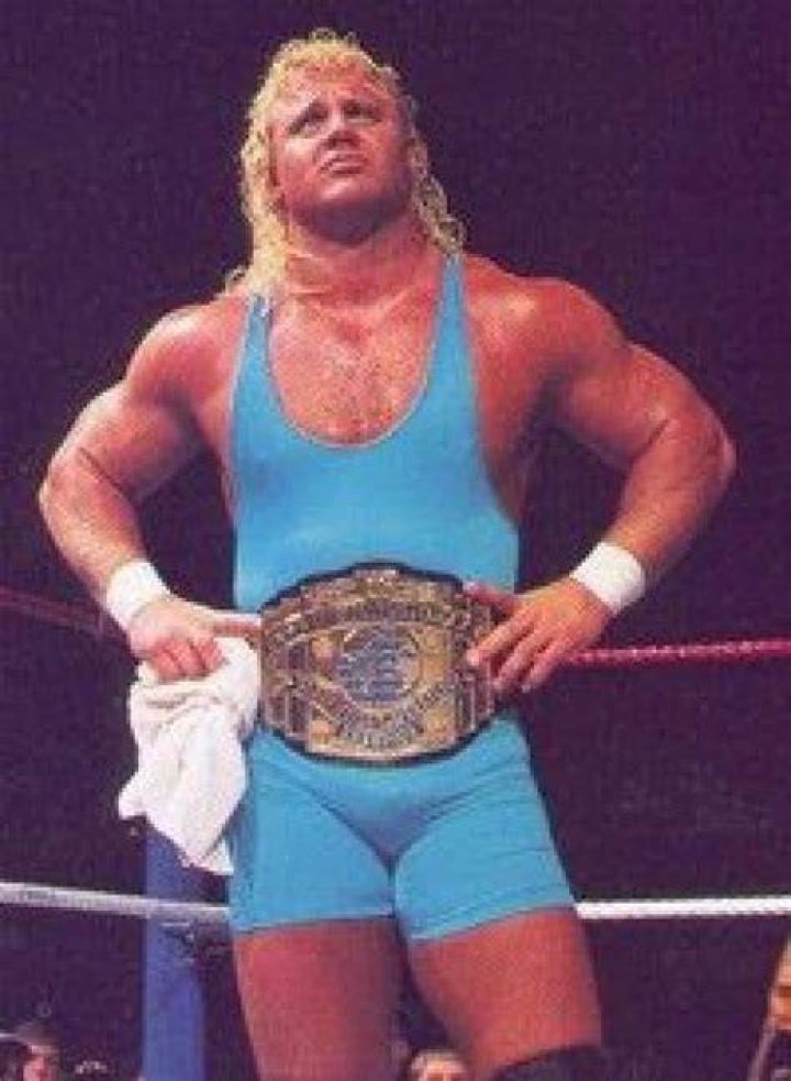 Curt Hennig as WCW United States & WWE Intercontinental Champion