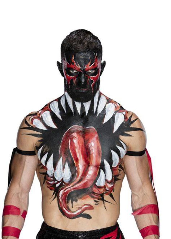 Demon Finn Balor making his entrance. 