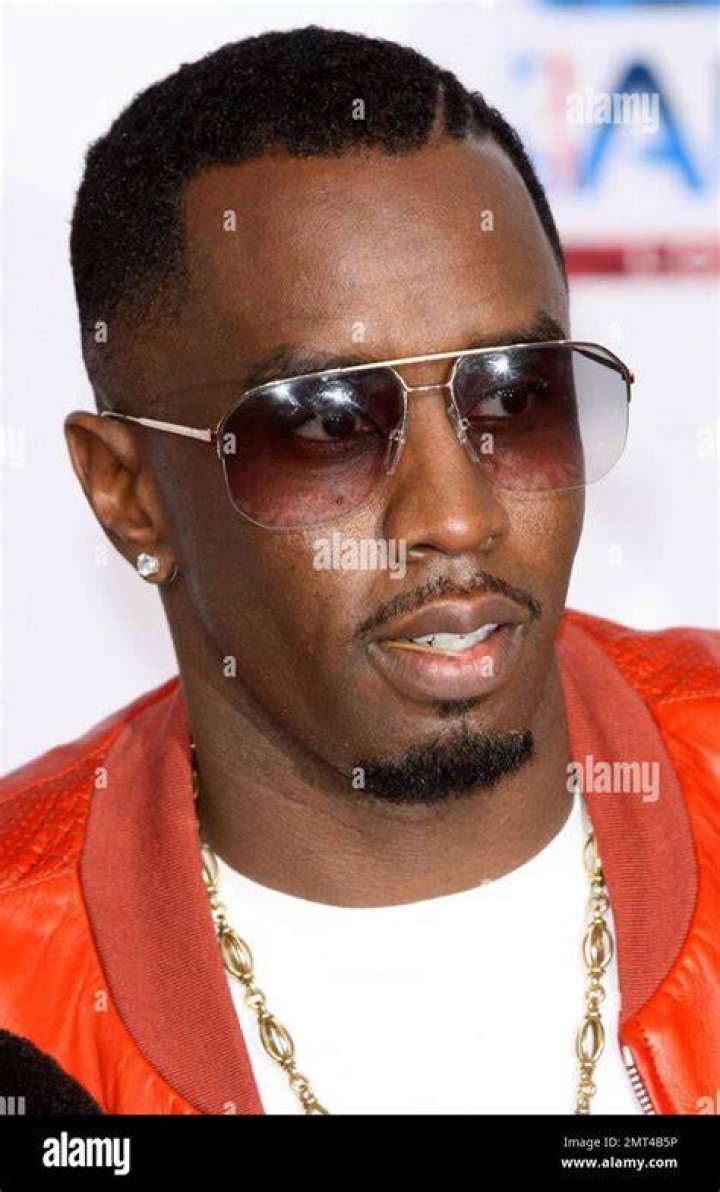 Diddy's Twin Daughters D'Lila and Jessie Match in Feathered Dresses