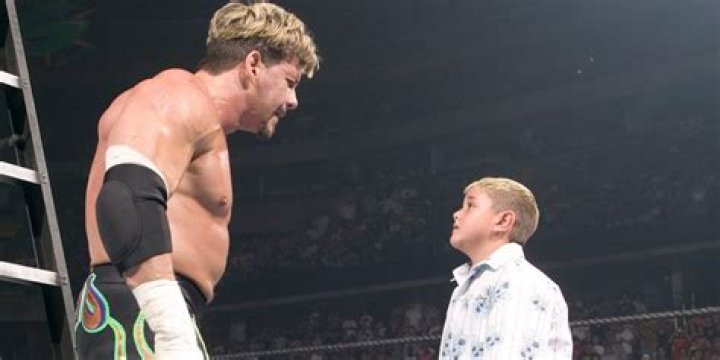 Eddie Guerrero talking to Dominik Mysterio