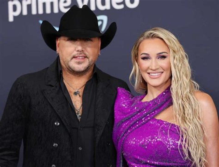 Jason and Brittany Aldean cuddle up at concert; Elizabeth Hurley stuns