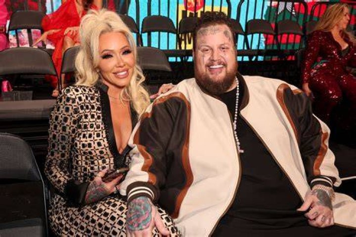 Jelly Roll And His Wife Bunnie XO Turn Heads On 2023 ACM Awards Red