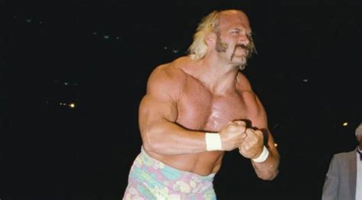 Jesse Ventura flexing