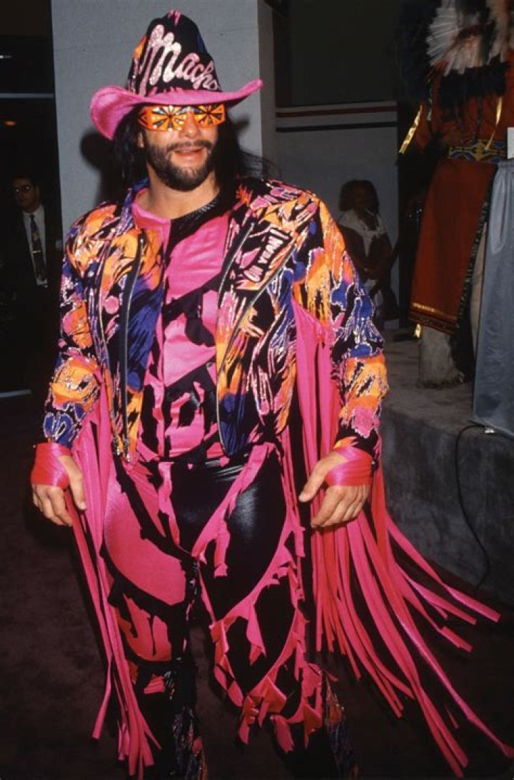 Macho Man Randy Savage wearing green and purple gear