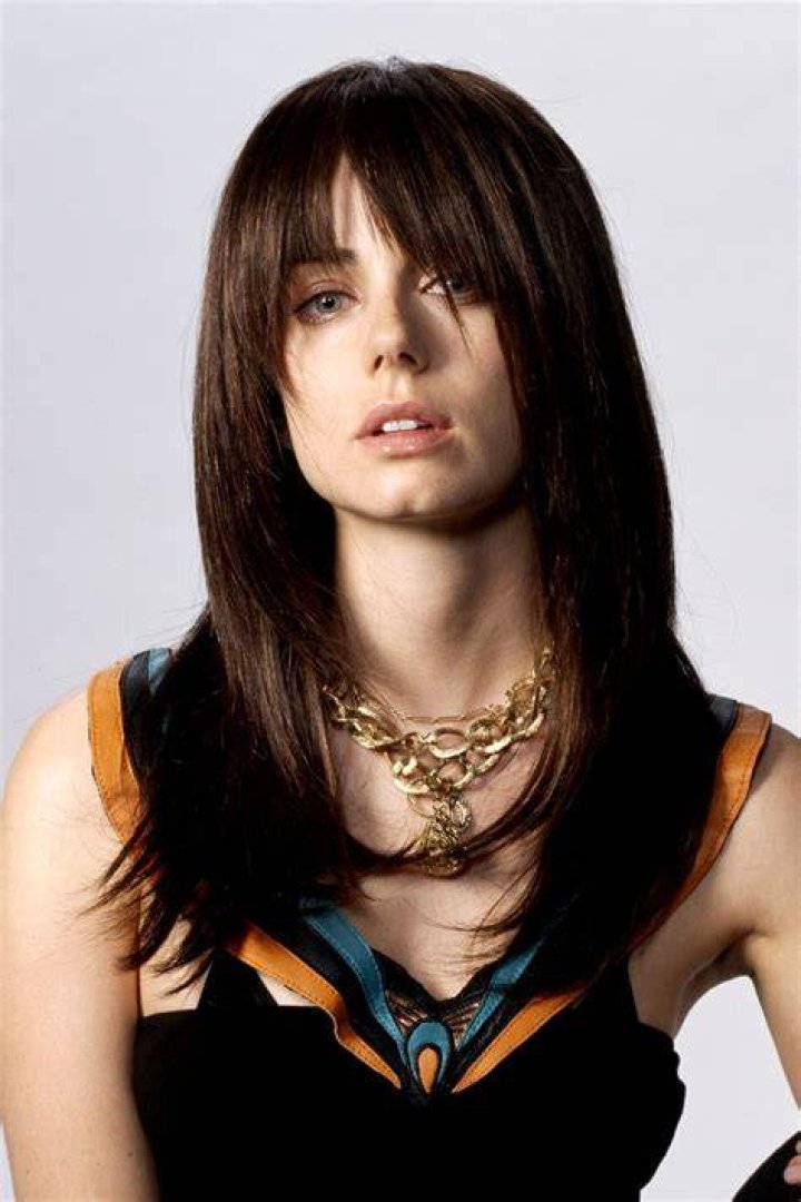 Mia Kirshner as Satyria Click in The Ballad of Songbirds and Snakes