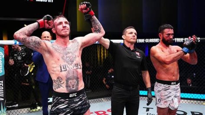 Rhys McKee puts his hands up for a UFC fight