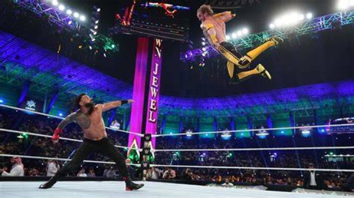 Roman Reigns and Logan Paul in WWE