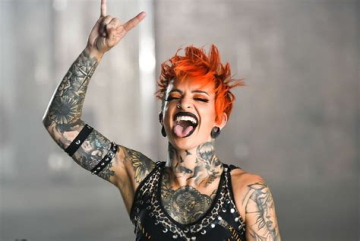 Ruby Soho with the A1 Alpha Male Championship and in AEW