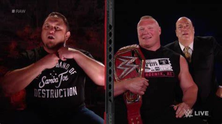 Samoa Joe chokes Brock Lesnar