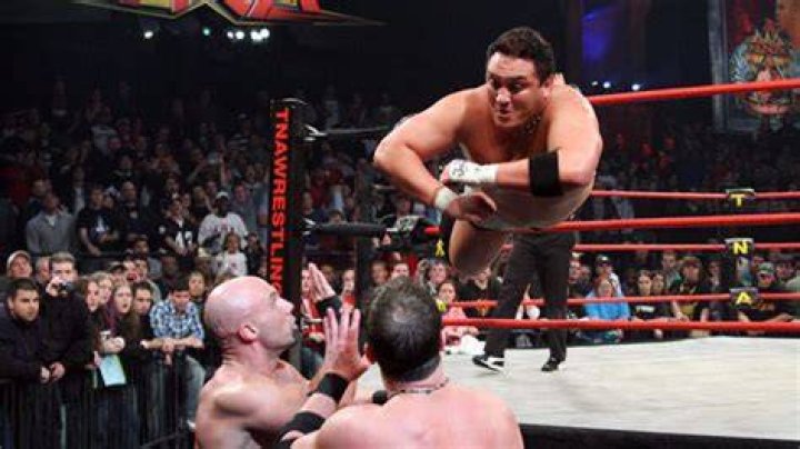 Samoa Joe dives to the outside