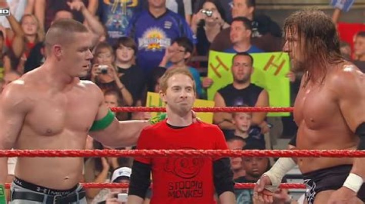 Seth Green with John Cena and Triple H