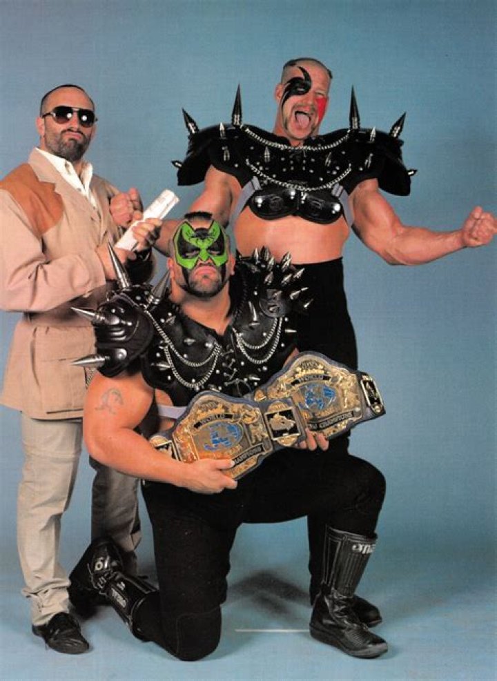 The Road Warriors and Paul Ellering. 