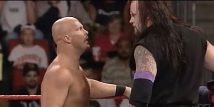 Undertaker and Steve Austin collide in a Buried Alive Match